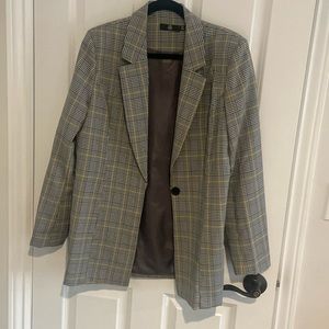 Women’s blazer, black, white with yellow stripe plaid. Lined with gray lining.